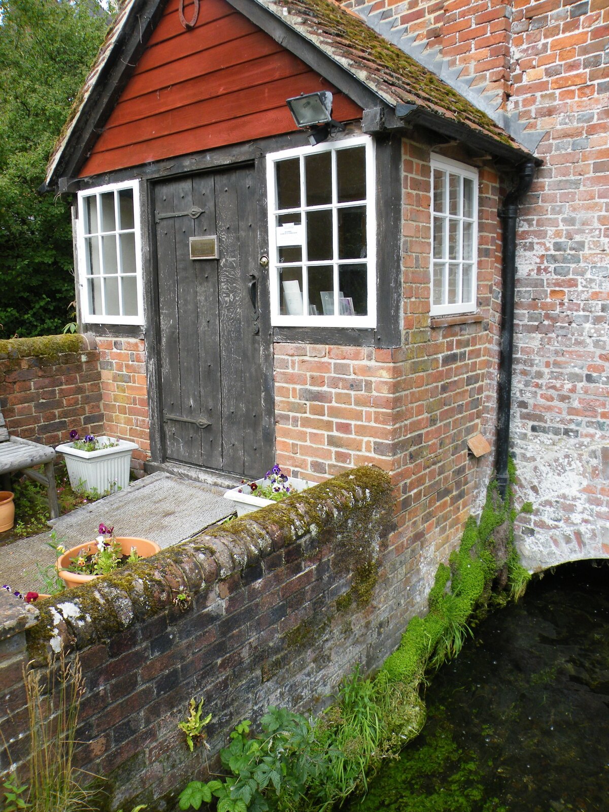 The brick and timber entrance to The Rose Clinic at Town Mill