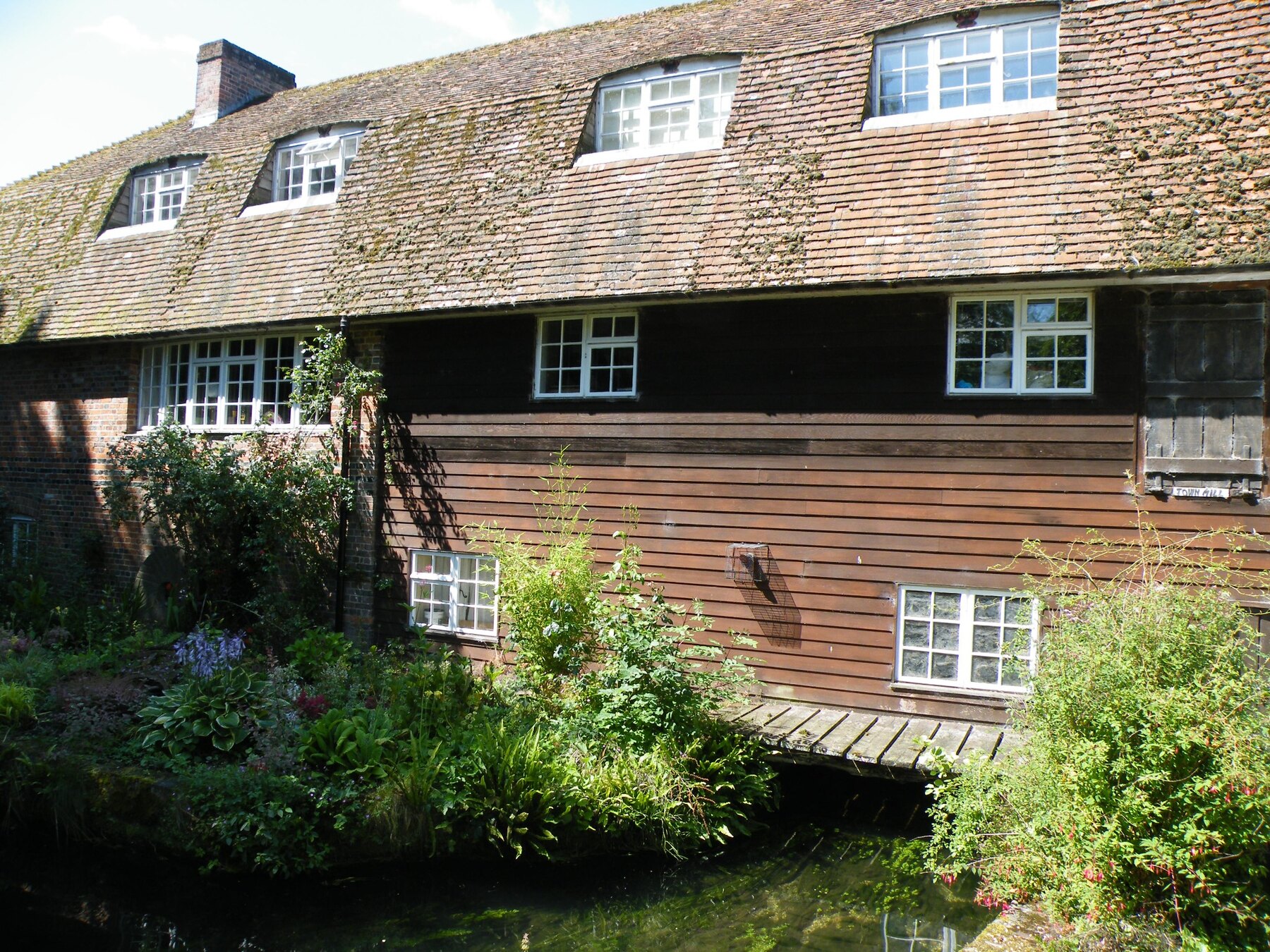 Historic Town Mill building beside the River Test