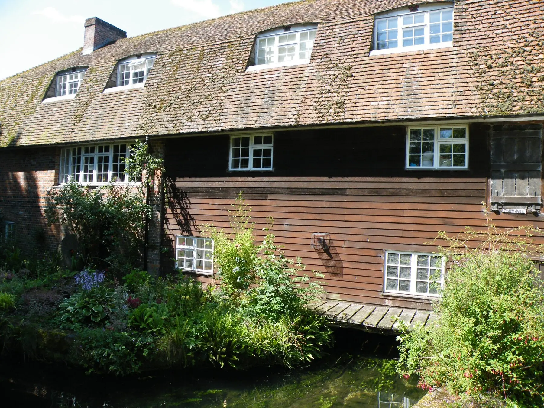 Historic Town Mill building beside the River Test